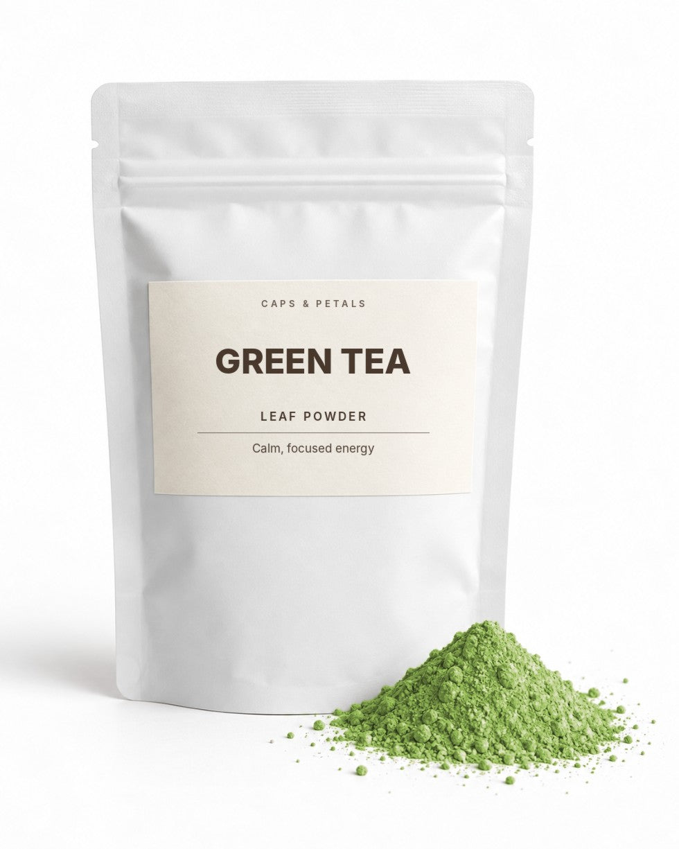 Green Tea leaf powder by Caps & Petals in a white pouch