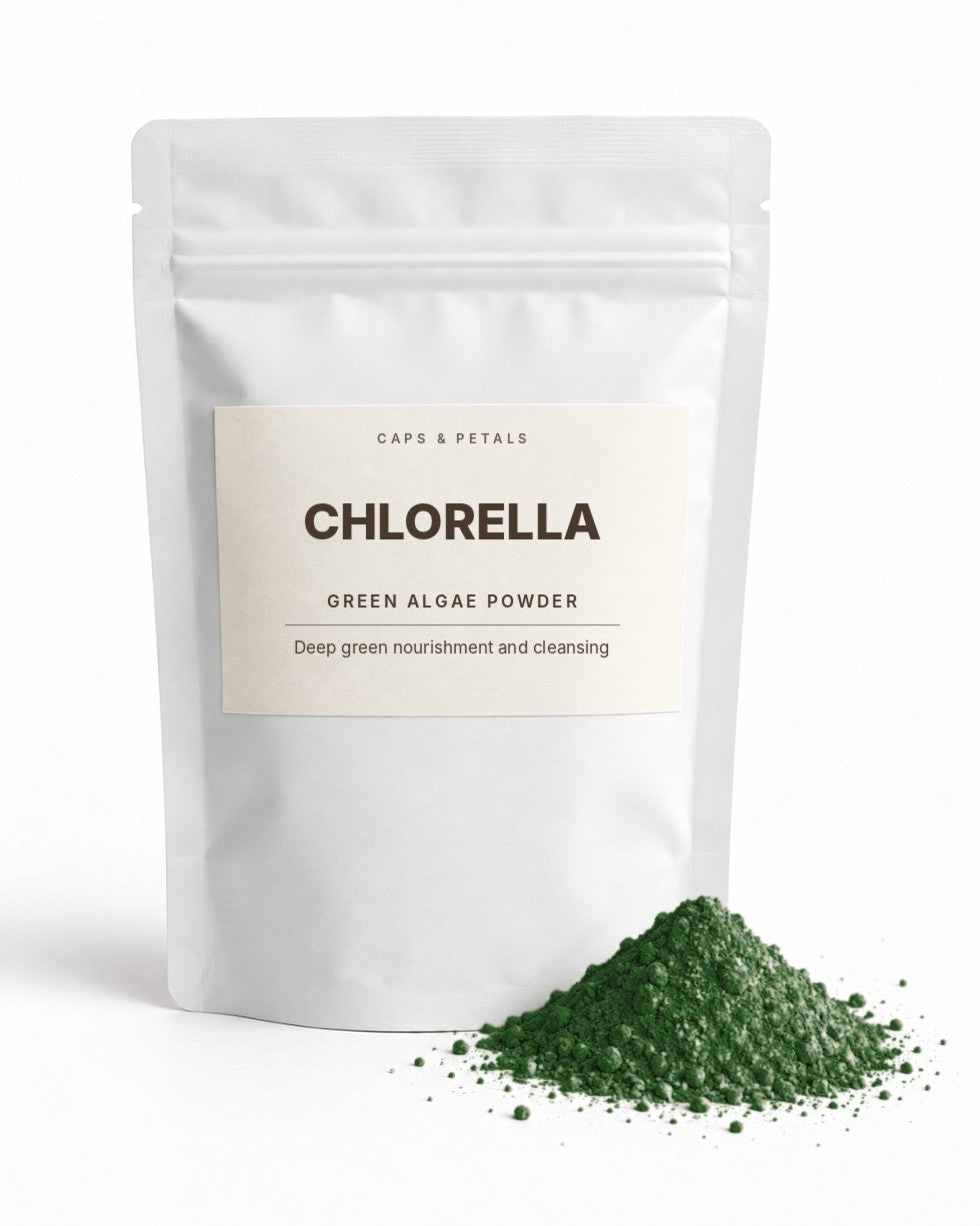 Chlorella green algae powder by Caps & Petals in a white pouch