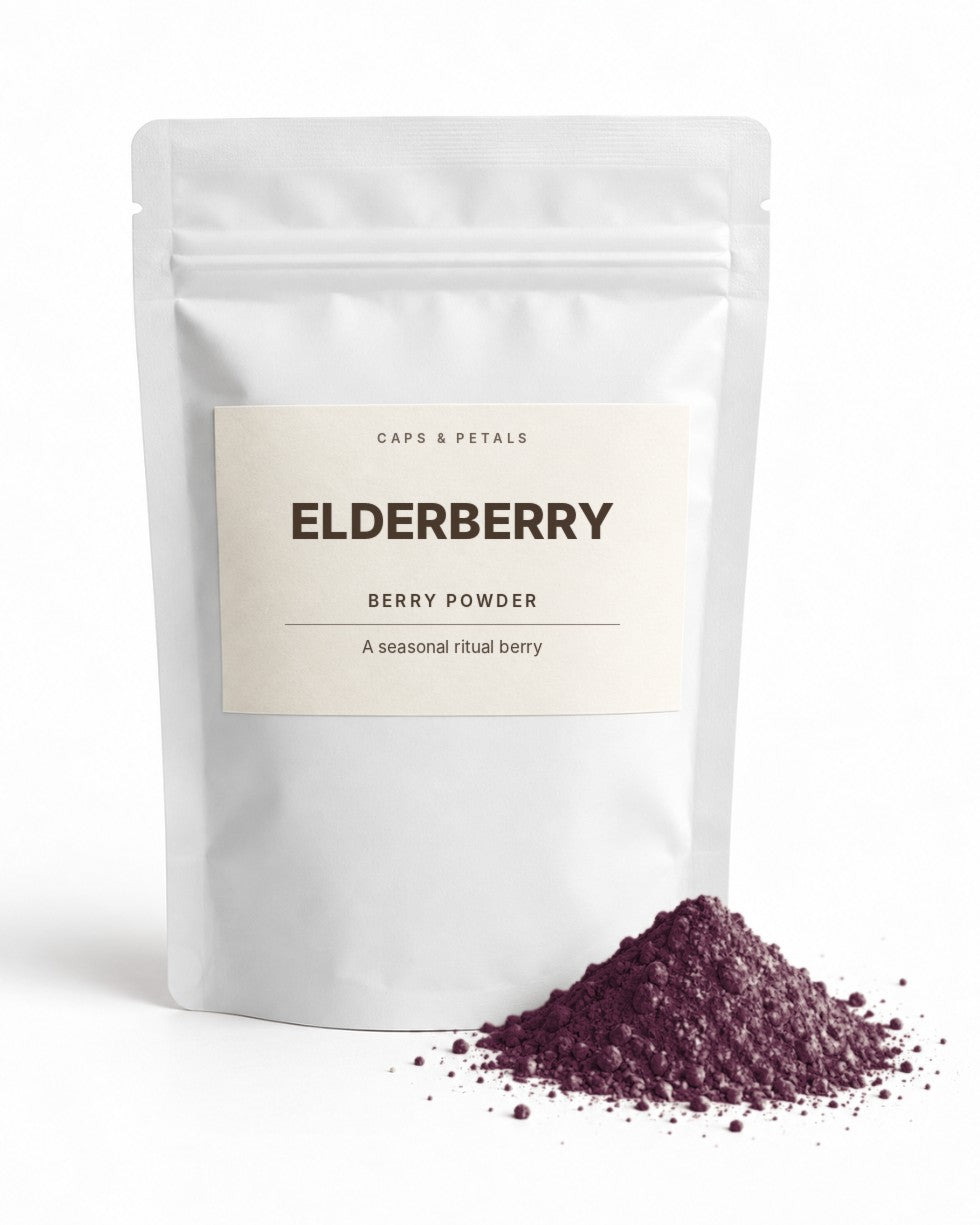 Elderberry powder by Caps & Petals in a white pouch