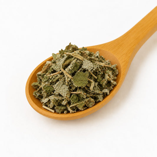 Raspberry Leaf on a wooden spoon by Caps & Petals
